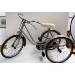 A vintage silver painted children's tricycle 58cmH