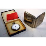 A cased silver pocket watch with engine turned back and white enamel 24hr dial and a silver