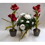 Three pots of artificial flowers