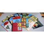 A large selection of Tintin books, nine hardbacks and eight paperbacks: Tintin and Alph-Art,