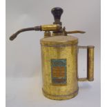 A vintage compressed air sprayer, with label reading 'Dron-wall, sprayers, syringes,