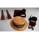 A mixed lot to include two perspex bookends, a straw boater hat,