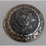 A sterling silver brooch with an aztec design to the front 4.