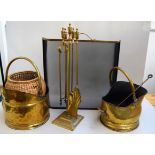 Two brass coal scuttles together with two brass fire guards,