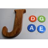 The letter 'J' cut from hardwood 23cmH, together with magnetic letter plates A, E, D, and G, 6.