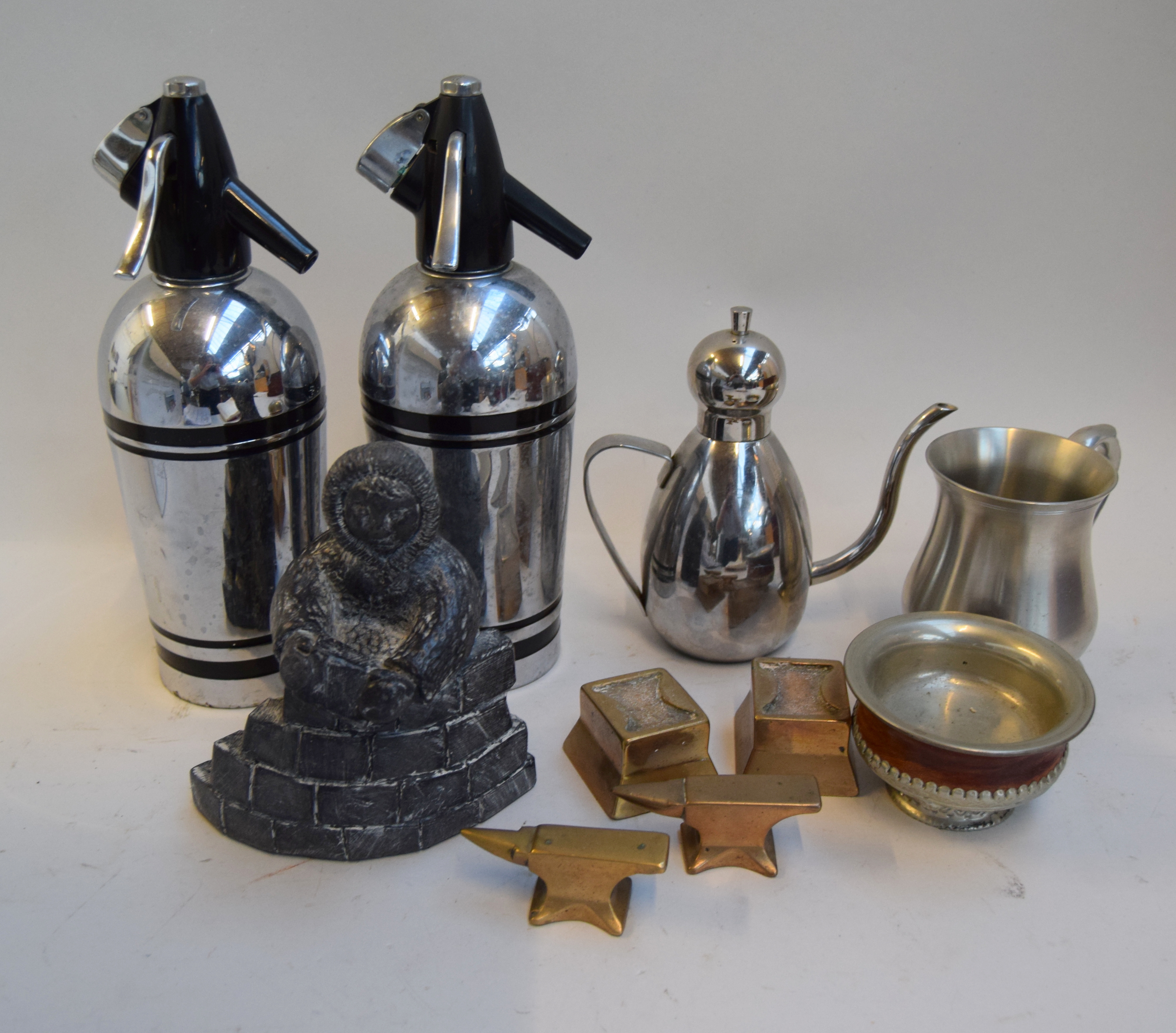 A mixed lot to include two vintage soda siphons,