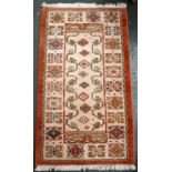 A Kabir wool rug retailed by John Lewis 85 x 155cm