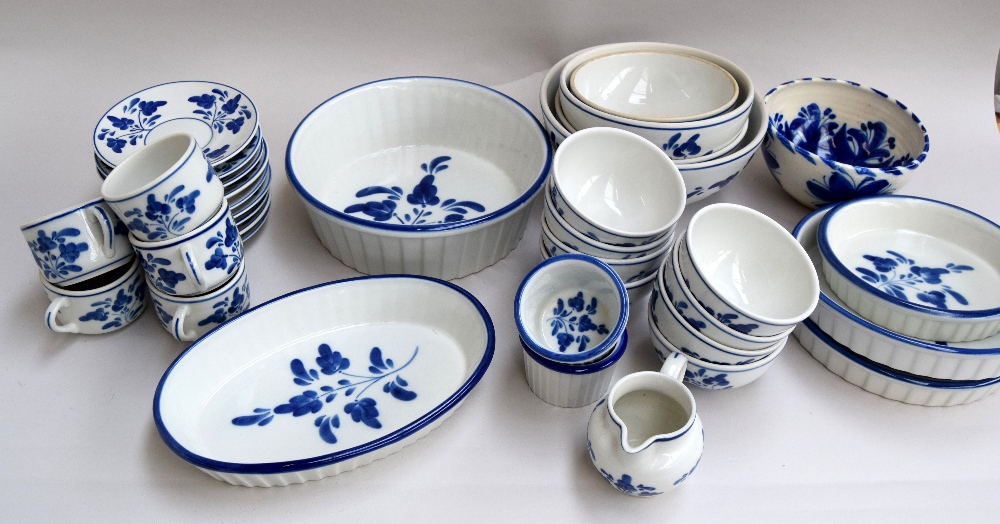 A Portuguese dinner service in blue and white to include plates, side plates, dessert plates, bowls, - Image 4 of 4