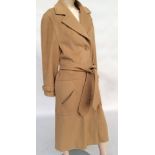 Belted camel hair coat, silky pile, diagonal pockets in square patches to each hip,