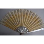 A collection of four Victorian and Edwardian fans, chocolate brown ostrich feather,