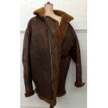 Old brown sheepskin flying jacket,
