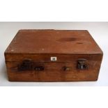 A vintage pine carpenter's chest containing various wood planes including blade makers such as A