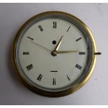 A brass ship's clock, 27cmD to rear,