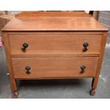 A pine chest of two drawers