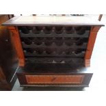 A teak wine rack 70cmH for 24 bottles