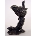 A silver naturalistic model of a wren perched on a branch, maker 'CA' 1991 Birmingham,