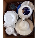 A mixed selection of terra cotta baking dishes, china,