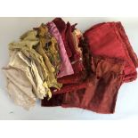 Box containing very old red silk damask curtains and further lengths of damask and pelmets.