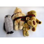 A Pedigree teddy bear and three others