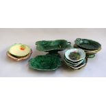 Two boxes of majolica plates and dishes mainly foliate decorations (2)