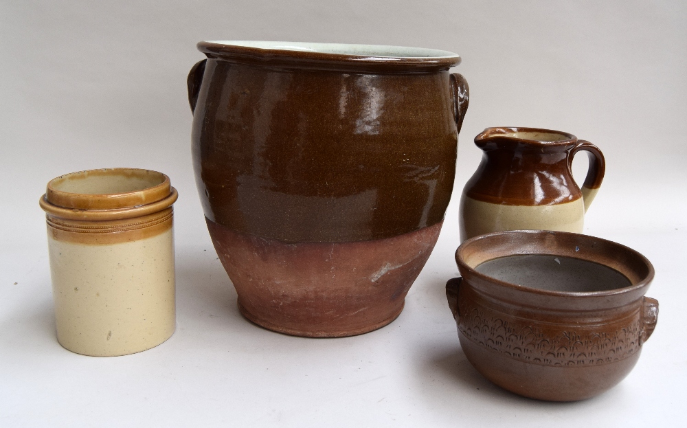 Three stoneware jars and a jug