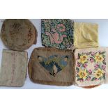 Collection of old tapestry cushion covers and one of yellow velvet,