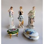 Three continental figurines of women,