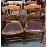 A set of four kitchen chairs