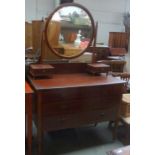 A dressing table with adjustable mirror above two drawers (missing single caster)