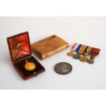 A set of four rosette medals: the 1914-915 star, The British War Medal,