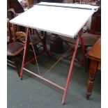 An UDO architects drawing table in red