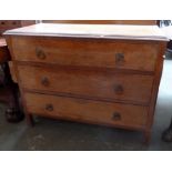 A pine chest of three drawers,