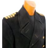 A 1944 WW2 Fleet Air Arm great coat with all original buttons and in good overall condition - one