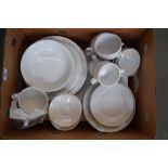 A plain white Italian porcelain part dinner service