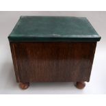 A hinged sewing chest full with sewing materials and a small brass chest with hinged lid and