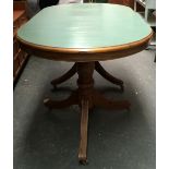 A pine dining table of twin pedestal base