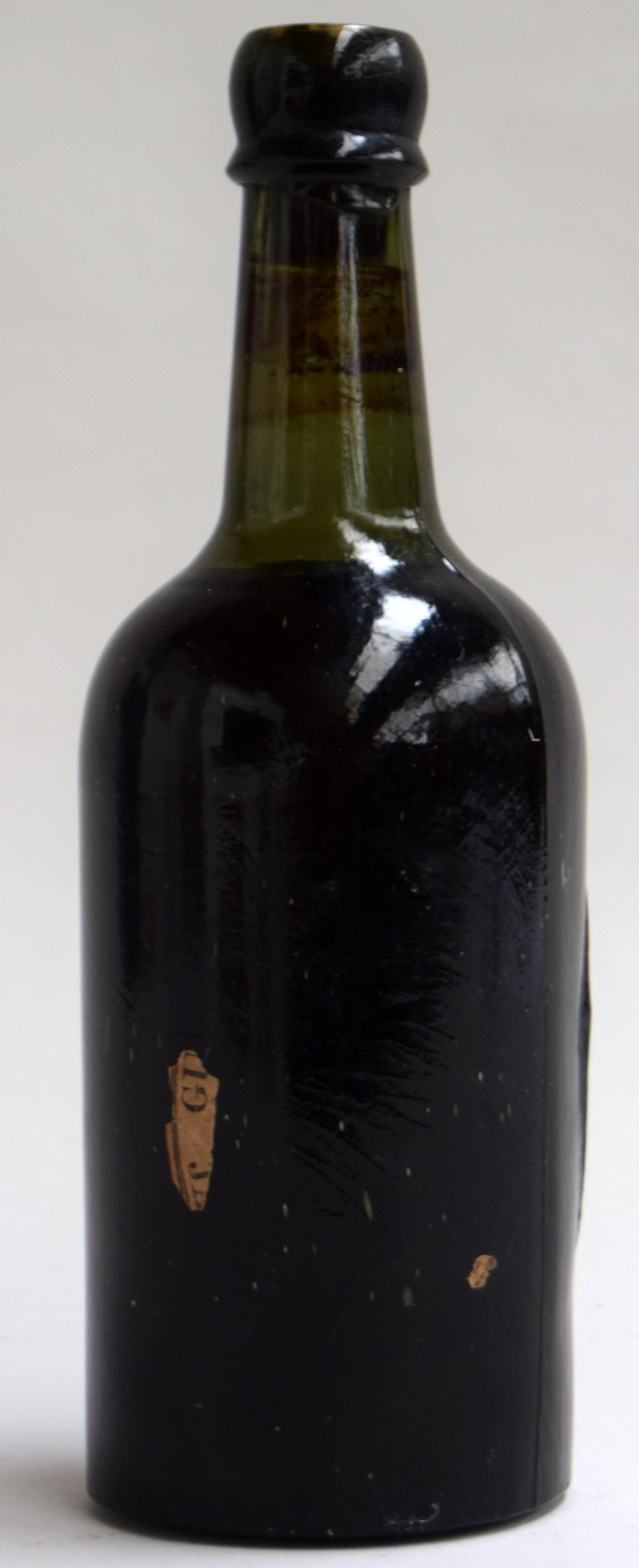 Brewing interest: an early 20th century Guinness bottle, still full with cork, - Image 2 of 2