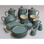 A quantity of Denby stoneware in green/blue with cream interior, including teapot, butter dish,