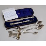 A large silver knife and fork made by George Angell in 1854-5, in blue velvet lined case,
