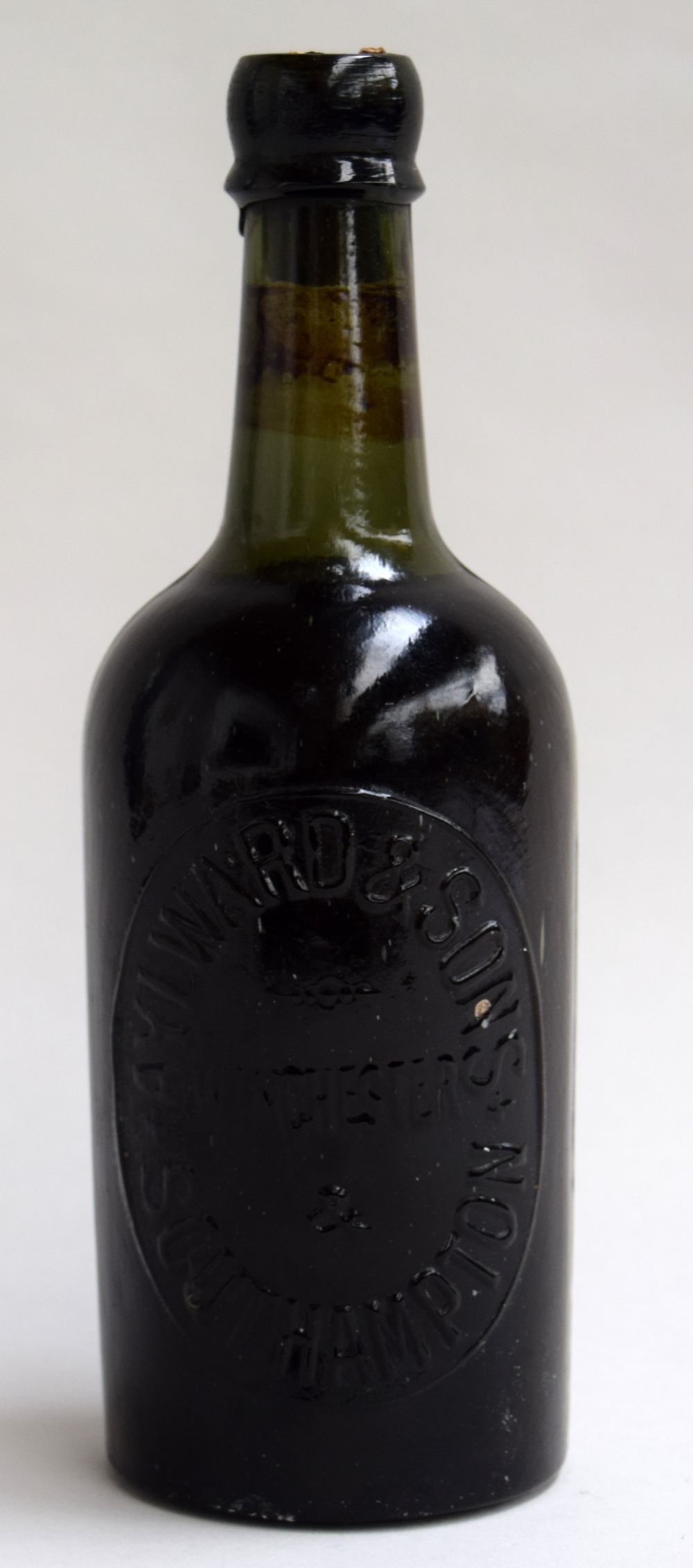 Brewing interest: an early 20th century Guinness bottle, still full with cork,