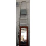 An aluminium folding step ladder and a pine frame wall mirror