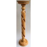 A handmade barley twist pot stand of beech wood,