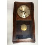 Two wall clocks including a Vienna style wall clock in need of restoration