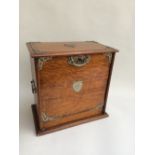 An Edwardian oak stationary box with with fitted interior to include letter rack,