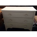 Painted pine chest of three long drawers on bracket feet,