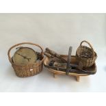 A wooden trug with Salter spring balance, three sickles,