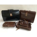 A brown leather school satchel, 32x28x7cm, a black leather gentleman's briefcase, 45x33x15cm,