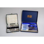 A set of eight EPNS cake forks, in box, along with six Coalport fine bone china knifes,