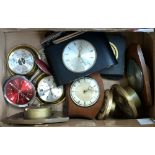 A collection of non-working clocks for spares or repairs