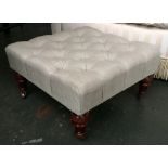 Ottoman footstool raised on turned legs, retailed by Cintique,